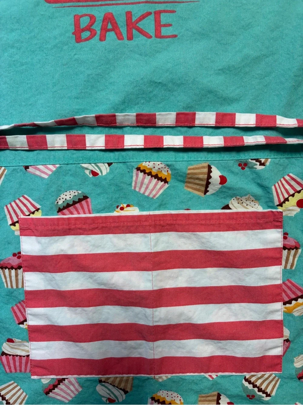 Apron striped features lettering